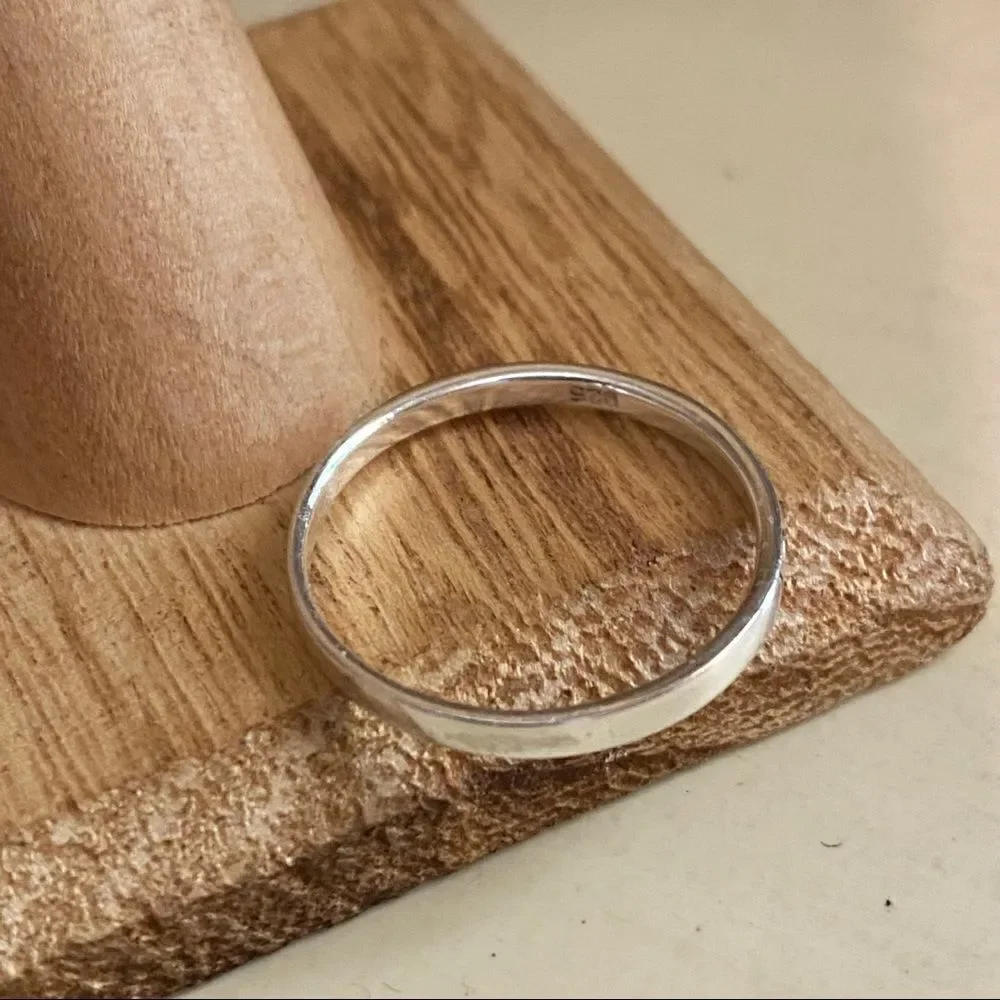 Namaste High Polish Sterling Silver Band Ring